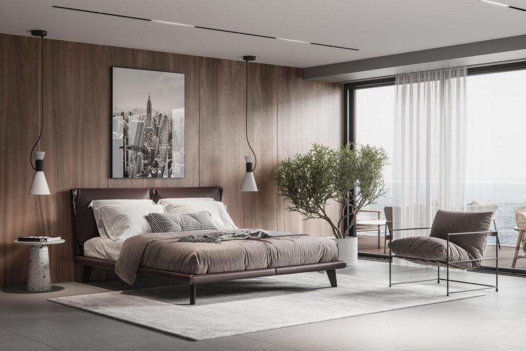 Stylish bedroom with a brown accent wall and floor to ceiling windows.